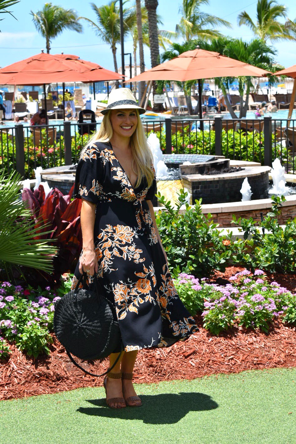Floral Wrap Dress, Fedora and Round Straw Bag in Marco Island Florida